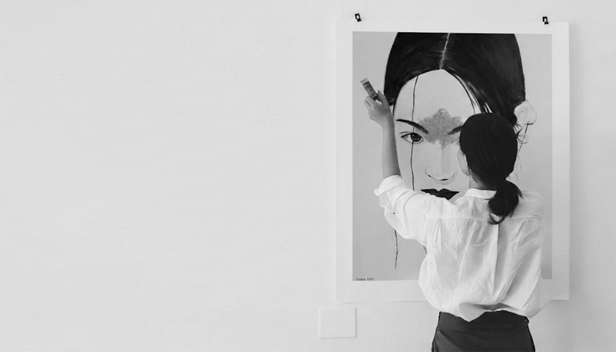 Dana Edri at work on one of her paintings