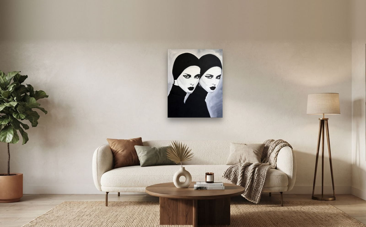 Twins — shown to scale above a sofa, oil painting by Dana Edri
